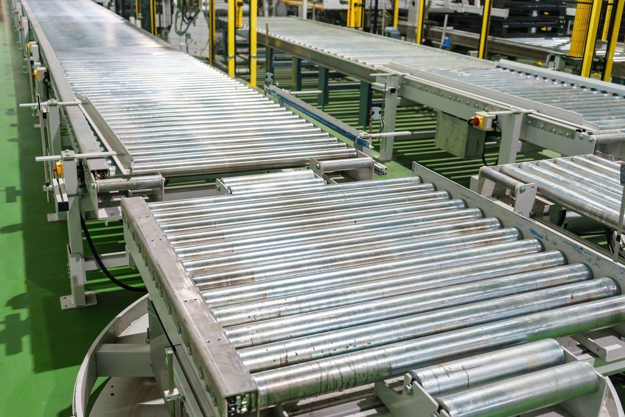 A roller conveyor line on a manufacturing floor